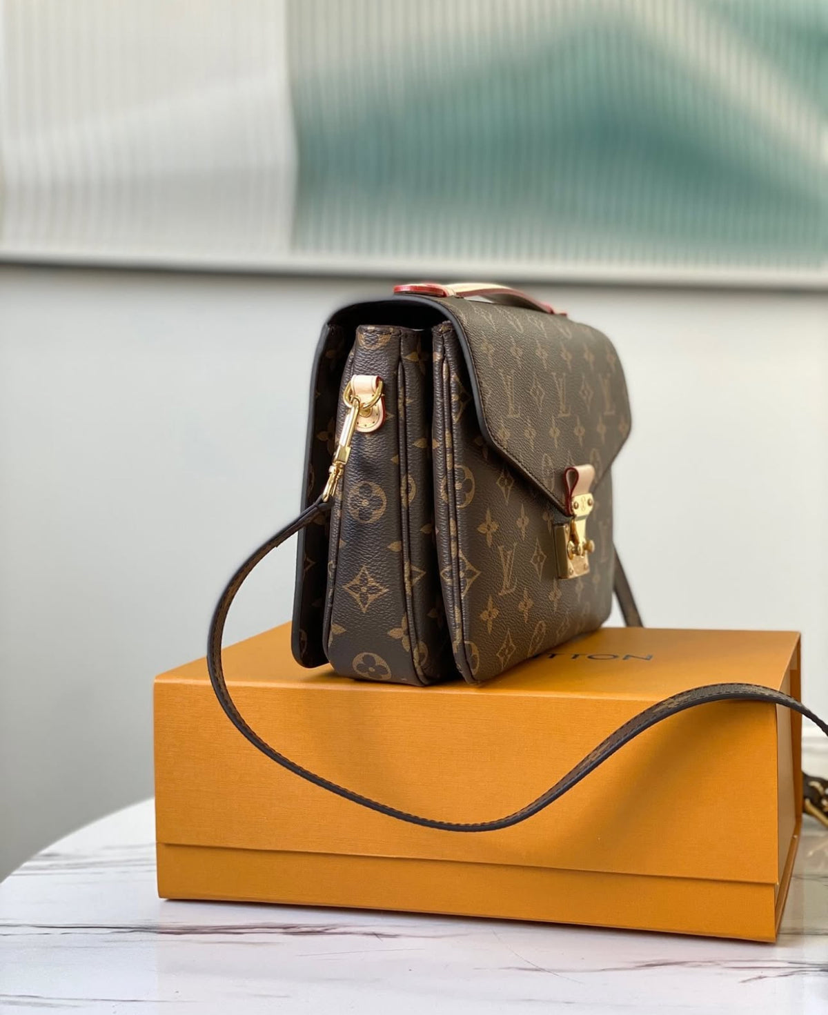 Bolsa Louis Vuitton Pochette Métis