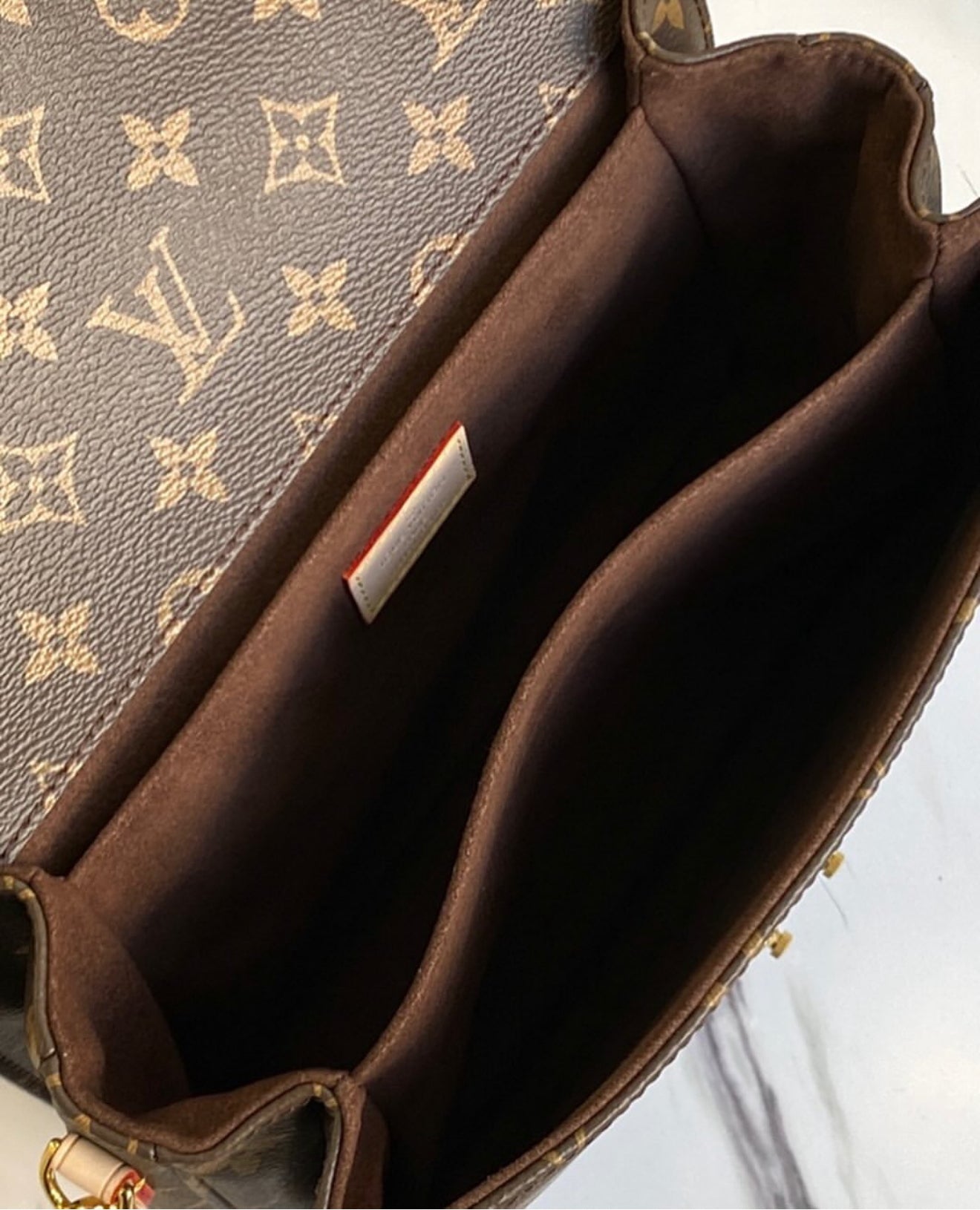 Bolsa Louis Vuitton Pochette Métis
